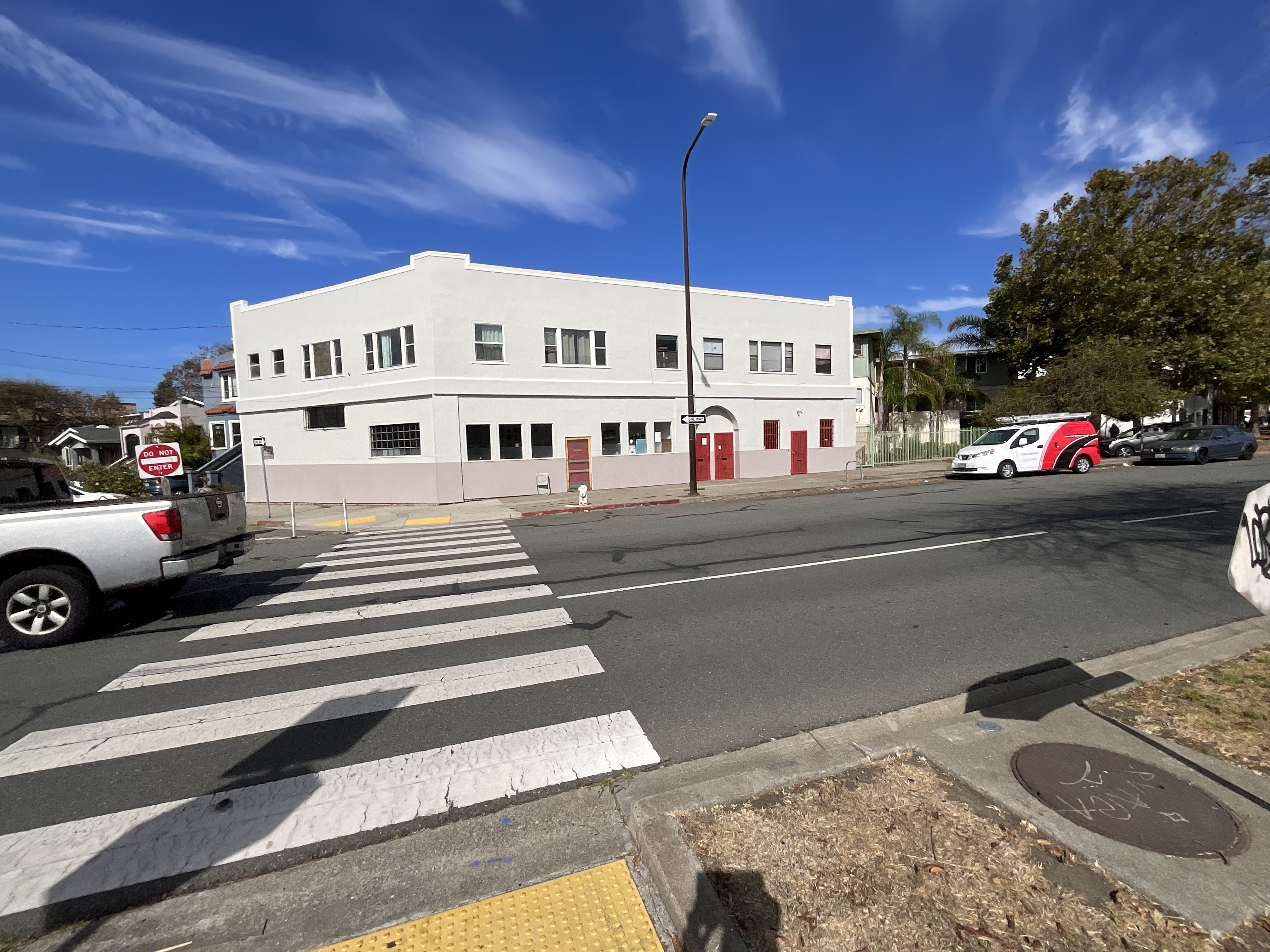 Two-story white commercial building
